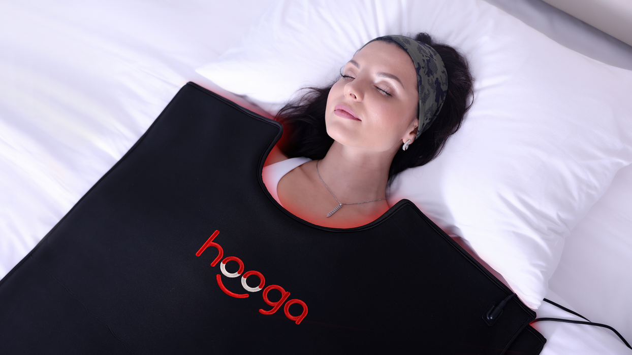 A girl using the Red Light Therapy pod XL